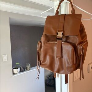 Classic Brown Faux Leather Diaper Backpack hardly used.